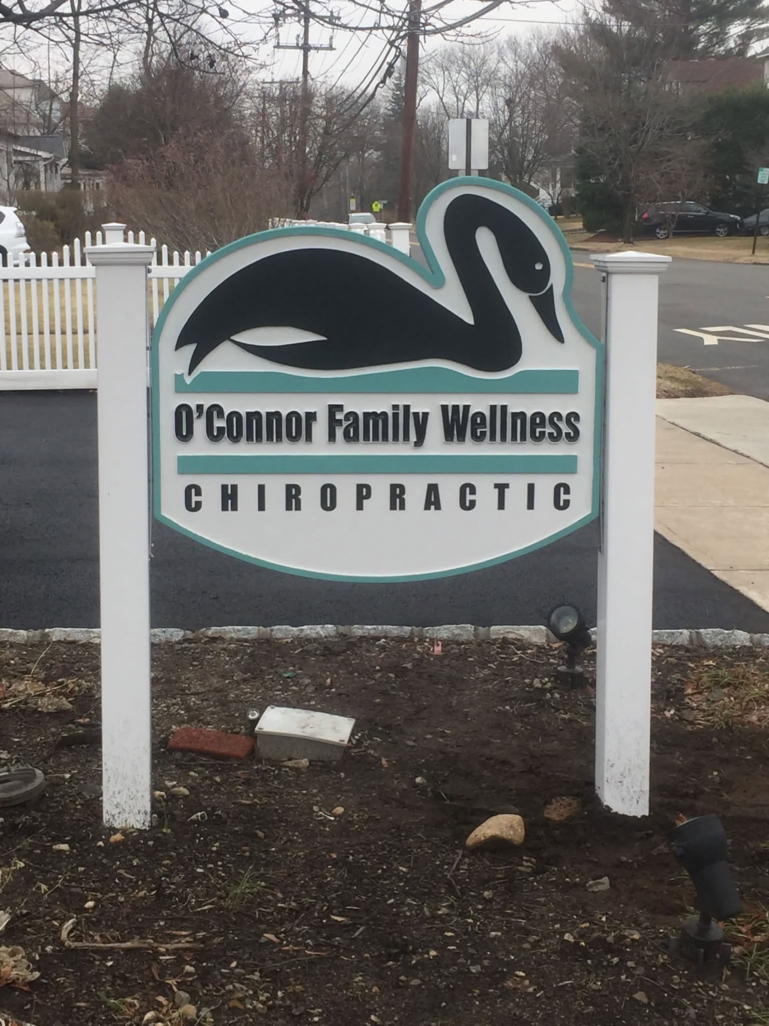Post-and-panel sign for O'Connor Family Wellness Chiropractic